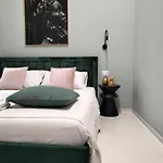 Xo *